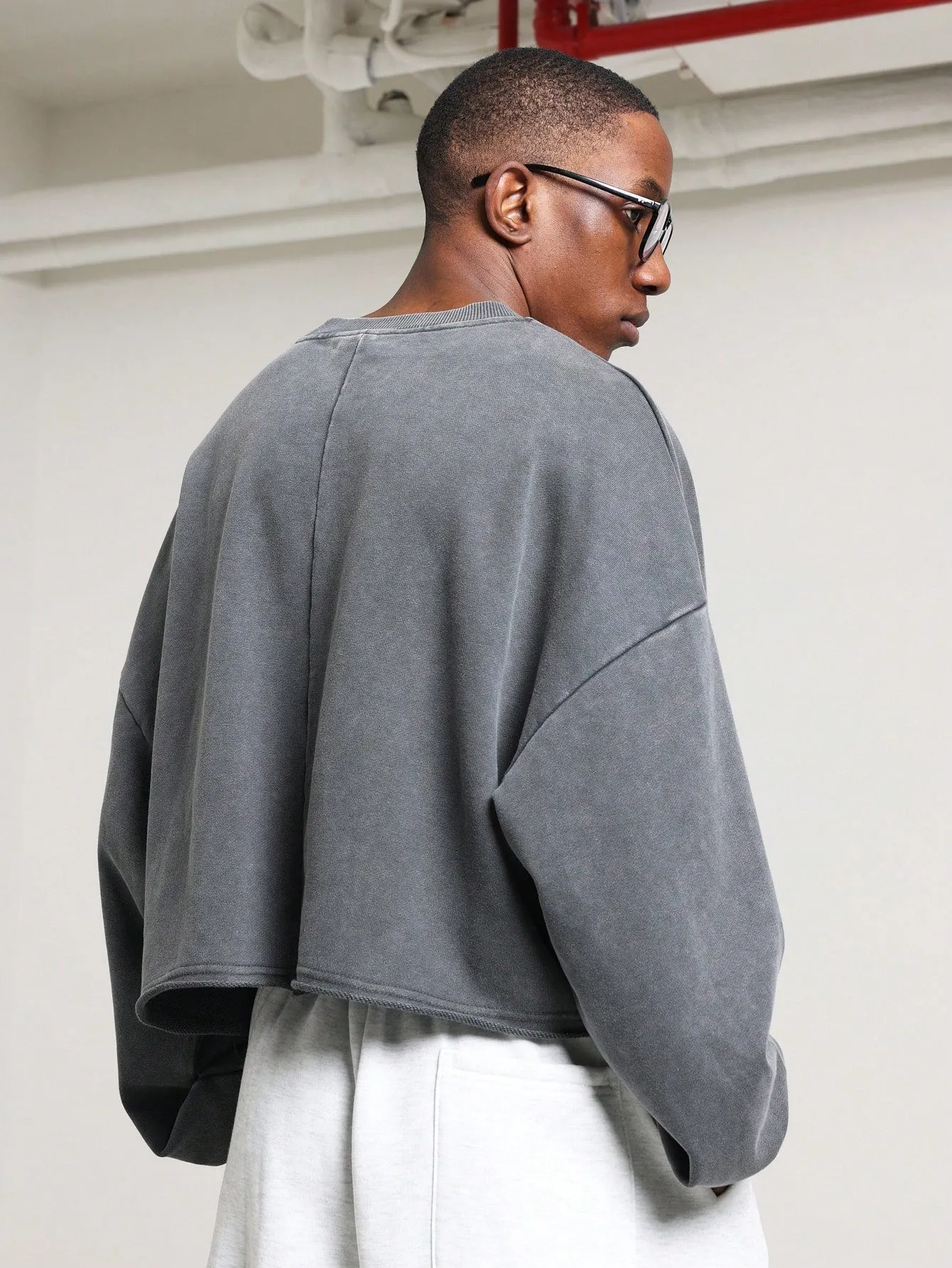 Crop Fit Washed Raw Edge Sweatshirt With Graphic Print